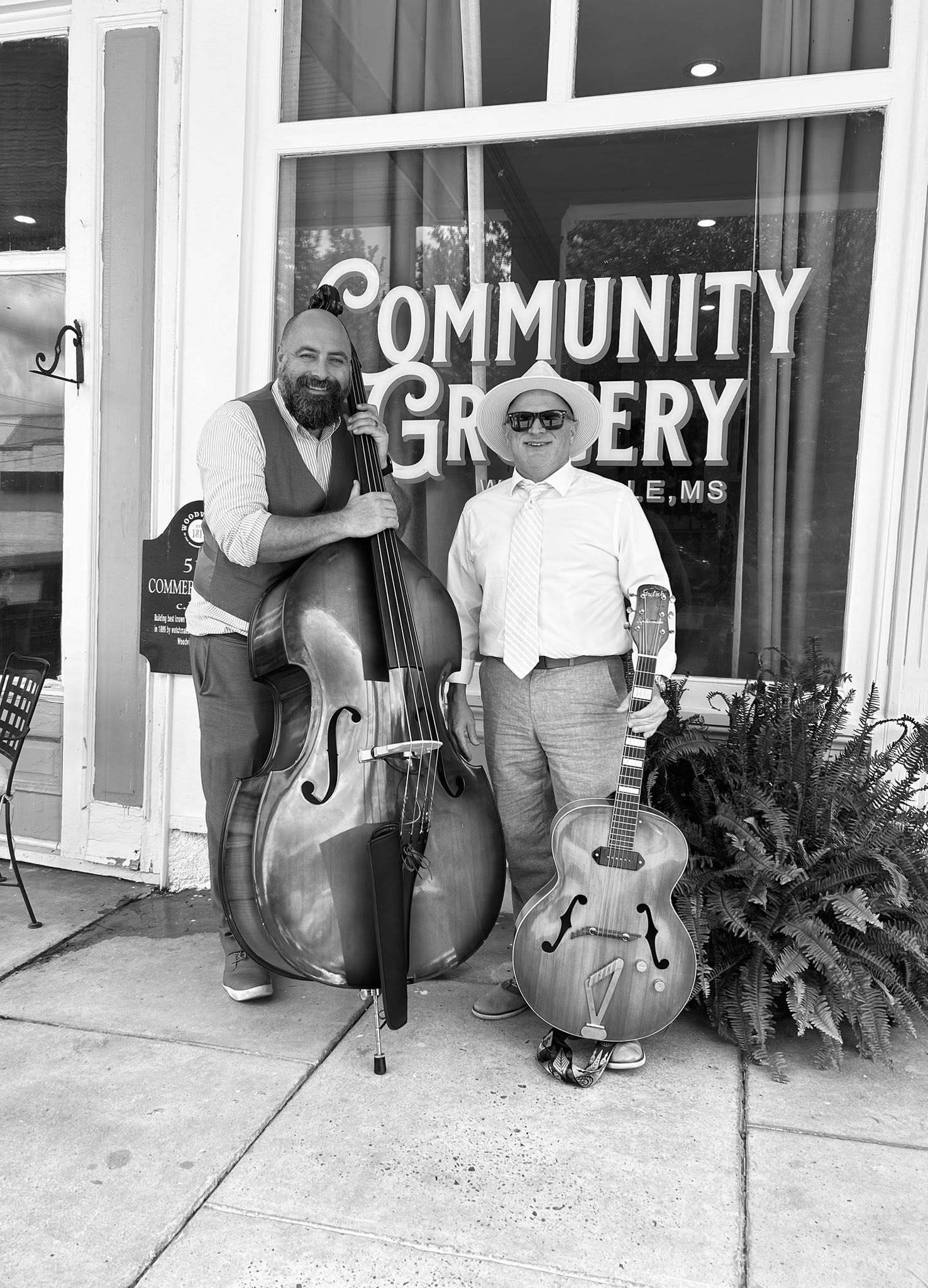 Jordan Tupper and Jim Standley outside Community Grocery Café in Woodville, Mississippi