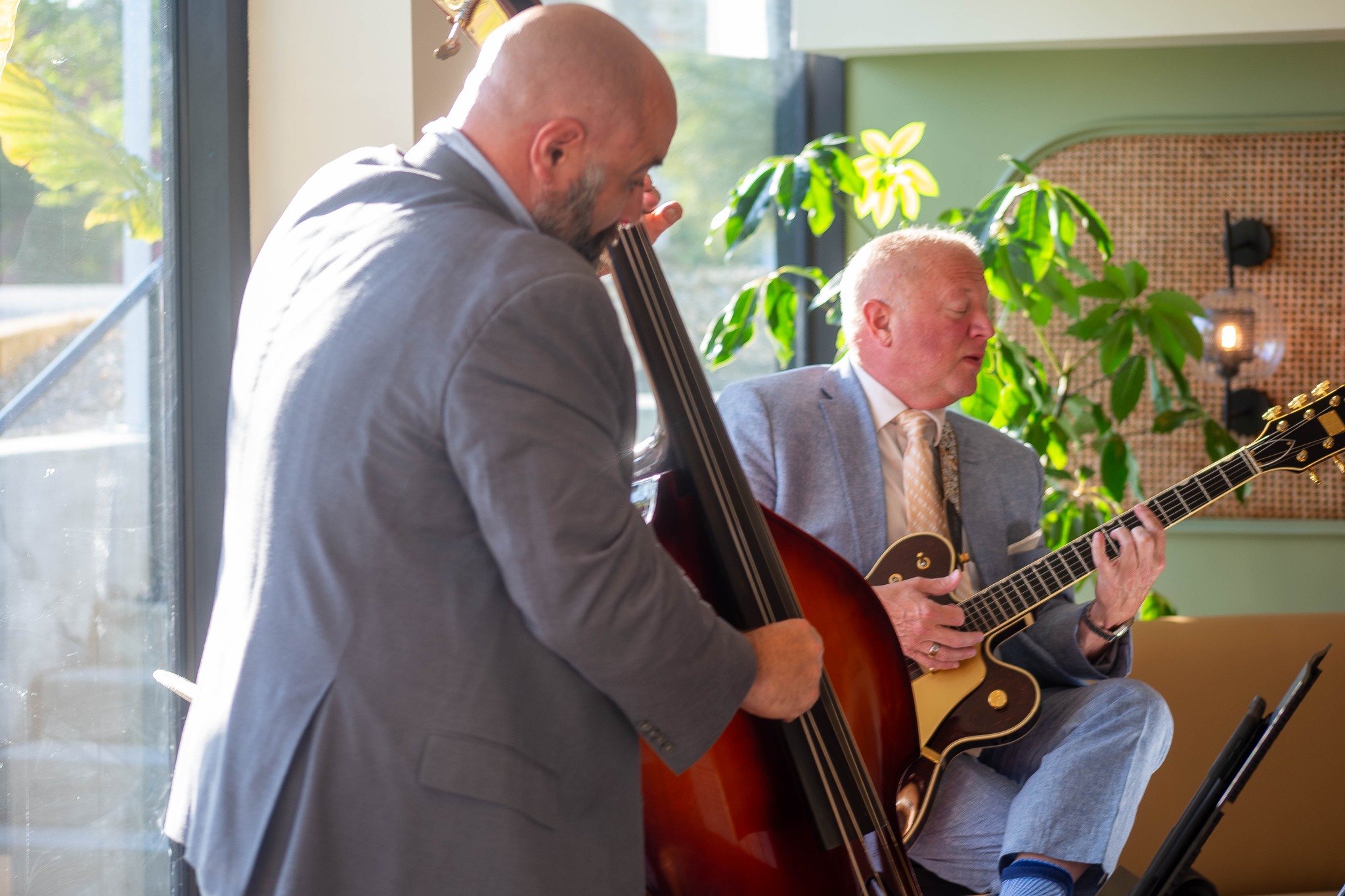 Jordan Tupper on upright bass and Jim Standley on guitar performing live jazz in Baton Rouge